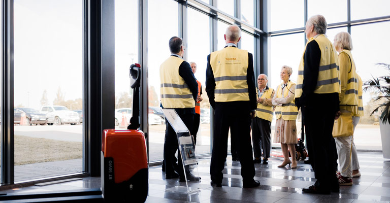 People visiting factory